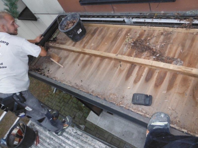 Sanierung von Eingangsdächern einer Wohnungsgenossenschaft